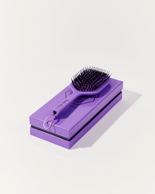 Purple hair brush